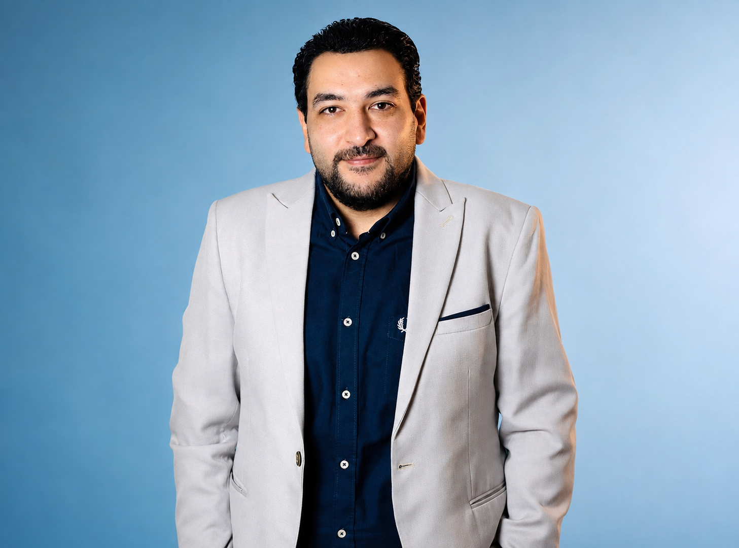 Dr Mohamed El-Zohairy seated at his clinic desk